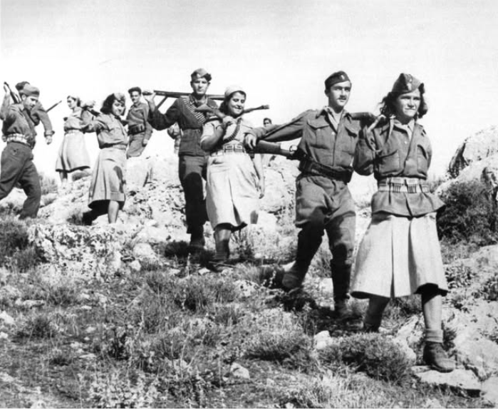 Guerrilla fighters with ELAS (The Greek People's Liberation Army) come down from a mountain in Greece - 19 October 1944